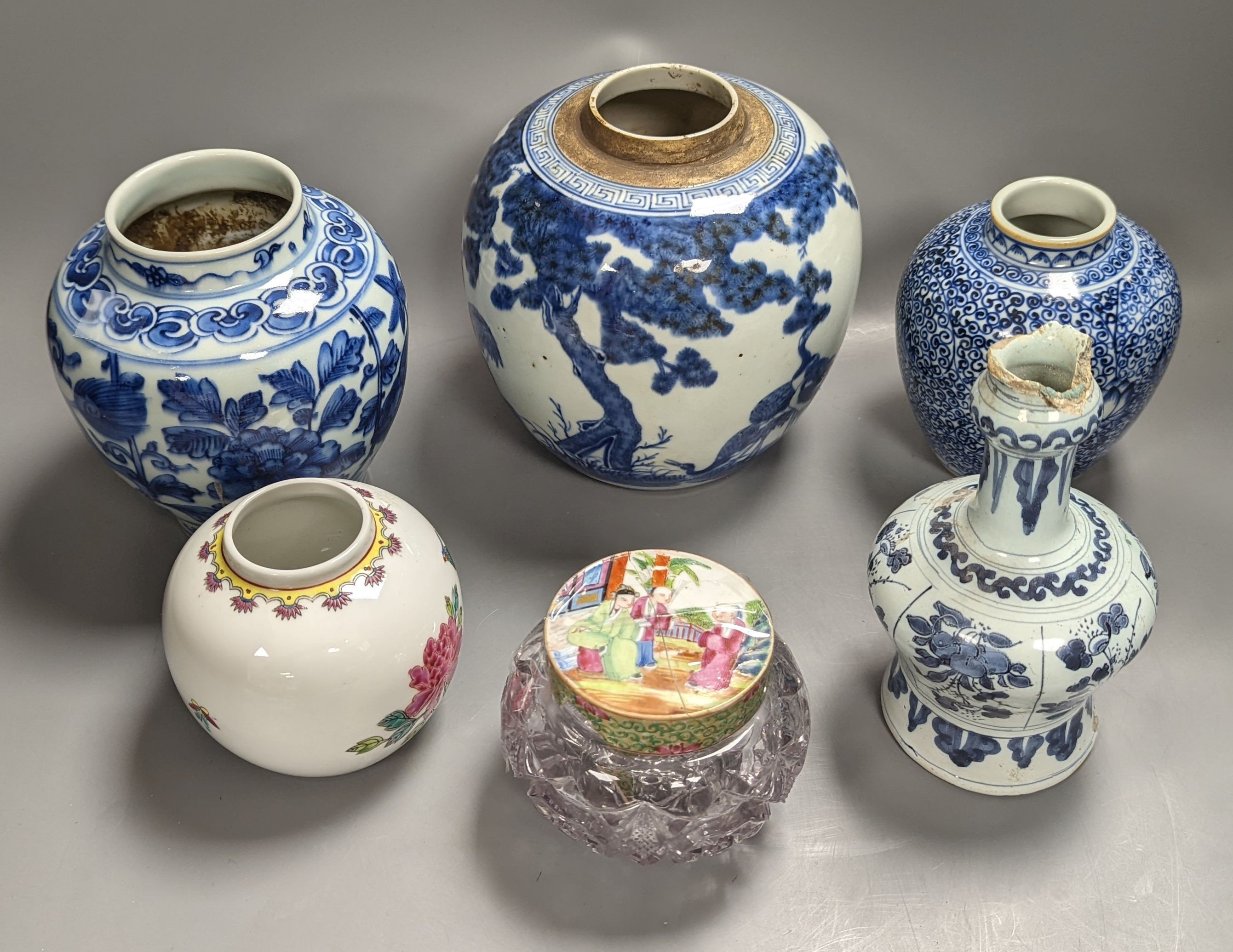 Four Chinese porcelain jars and a delft ware jar, 18cm and a pressed glass powder jar (a.f.)